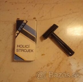 Holiaci strojček. - 1