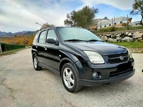 Suzuki Ignis, subaru justy,1.3 4x4 2005 čierna farba