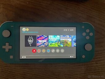 Nintendo Switch Lite + Box + Hry