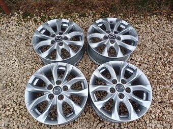 hlinikové disky org.Mazda 3--6,5Jx16--ET-50--5x114,3