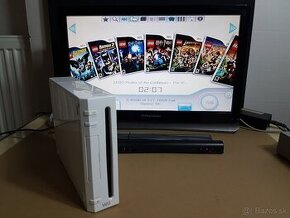 Nintendo Wii s príslušenstvom a 128 Gb hrami