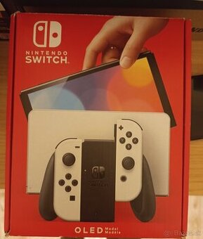 Nintendo switch oled + hra a obal na konzolu