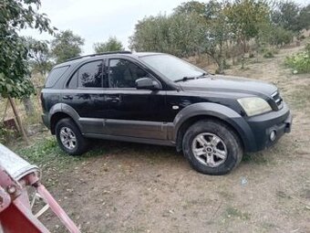 Kia Sorento čierne a strieborné.