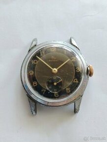 Staré mechanické hodinky Record na opravu