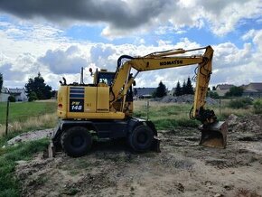 Kolový otočný bagr KOMATSU PW 148-10 - 1