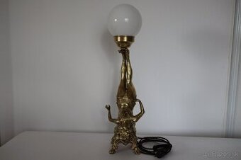 Starožitná stolová lampa mosadzná figurálna.