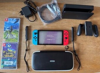 Nintendo Switch OLED + obal + hry