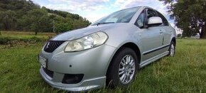 Suzuki SX4 sedan 1,6i vvti r.2010 - 1