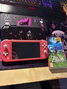 Nintendo switch lite(Coral pink) + Zelda: Breath of the wild