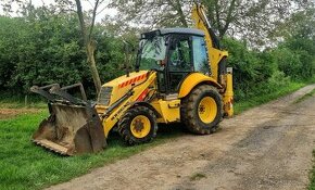 Traktorbager new holland LB110B