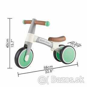 Zelený balančný bicykel Hape s 3 kolieskami