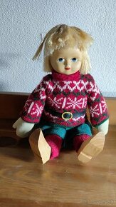 Stará bábika s porcelán tvárou a drevakmi