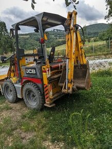 JCB 1cx smykom riadený nakladač minibager