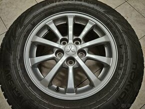 MITSUBISHI 16" + Nokian