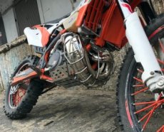 Kryt kolene výfuku KTM, Husqvarna, Beta, Gas Gas, Sherco