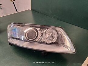 Pravý natacaci bixenon Audi A6 C6 4f originál Hella