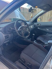 Nissan almera n16 - 20