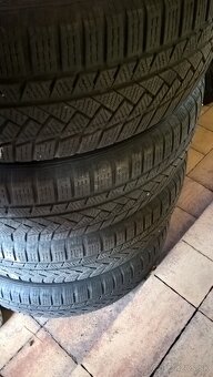 4 ks ZIMNÉ 215/65 R17 99H CONTINENTAL cca 5-6 mm DOT 4218 - 2