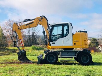 Kolesové rypadlo Liebherr A910 - 2