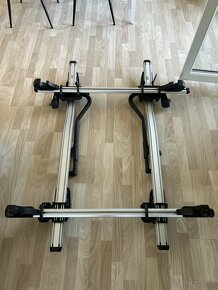 2x Thule nosic s priecnikmi(270€)/iba nosice (230€) - 2