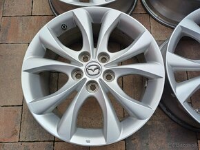 org.hlinikové disky Mazda---7Jx17-ET-52,5--5x114,3 - 2