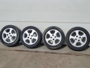 hlinikove disky Peugeot ,letne pneu 195/55 R15 4x108 - 2