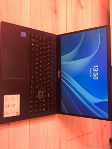 Asus E510 - 2