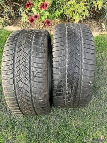 ))( Pirelli Sottozero 3 RSC 255/40 R18 - 2