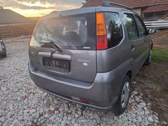 SUBARU JUSTY BENZÍN 4X4 - 2