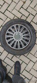 Predám 4kusi zimných kolies na skoda Fabia 185/65 R14 5x100 - 2