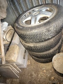 Predám disky Opel s pneu  185/65 R15 - 2