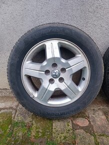 Celoročné pneumatiky Hankook 215/60 R17 + disky - 2