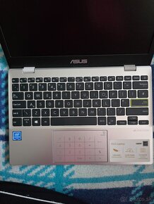 Asus E210M - 2