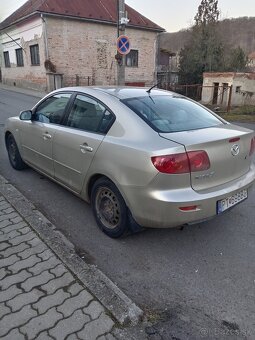 Mazda 3BK 2004.1,6 - 2