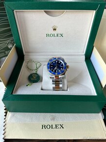 Rolex Submariner (papiere,box) - 2