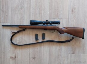 CZ-453 Varmint + Delta Optical Titanium 4-14x42 MilDot - 2