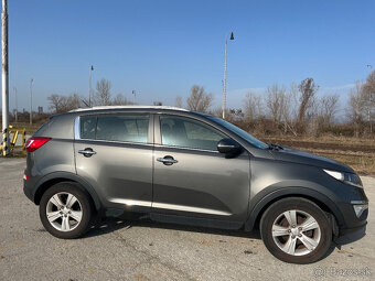 Kia Sportage 1.6 benzin dream edition r.v 2013 top stav - 2