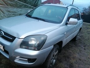 Kia sportage 2,0103kw,4x4 nafta - 2