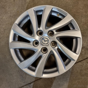 Mazda disky 5x114.3 R16 6.5J ET52.5 - 2