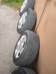 Disky R15 originál Škoda rozteč 5x112 elektróny pneu 195/65 - 2