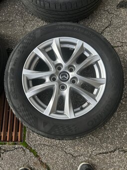 R16 Mazda 3 5x114.3 stred67.1 - 2