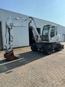 Kolový otočný bagr LIEBHERR A309 - 2