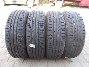 Plechové disky Ford + 185/65R14 - 2