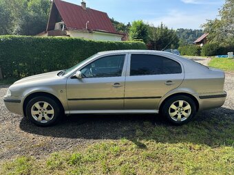 Škoda Octavia Tour 1,6 benzín, 75kW, rok:2004 + zimné pneu. - 2