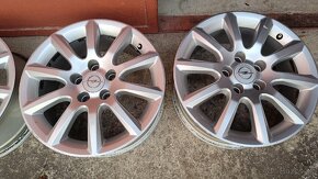 Originál 4ks alu disky 5x110 R16 z Opel Astra Caravan H 2004 - 2