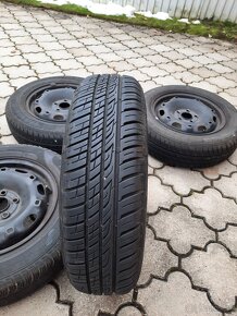 Predam pneu na diskoch 165/70 r14 - 2