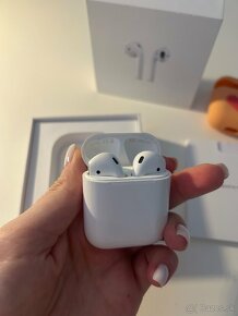 Apple AirPods 1 - 2