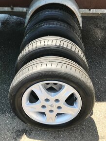 Alu kola Nissan Almera Tino 195/65 R15 - 2