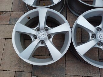 hlinikové disky org.Mazda--61/2Jx16-ET'52,5--5x114,3 - 2