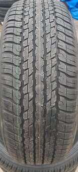 Celoročné Dunlop 265/60 R18 - 2